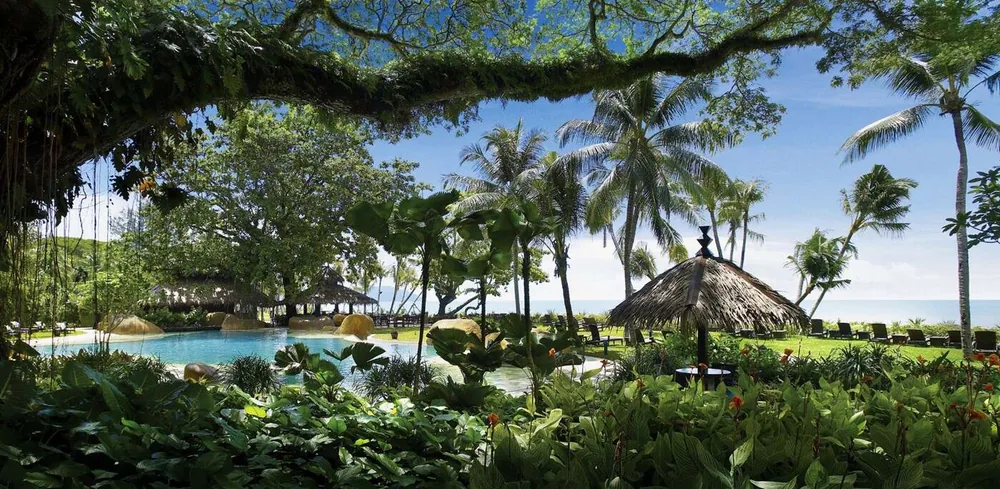 Pool and tropical gardens at Shangri-La Rasa Sayang, Penang